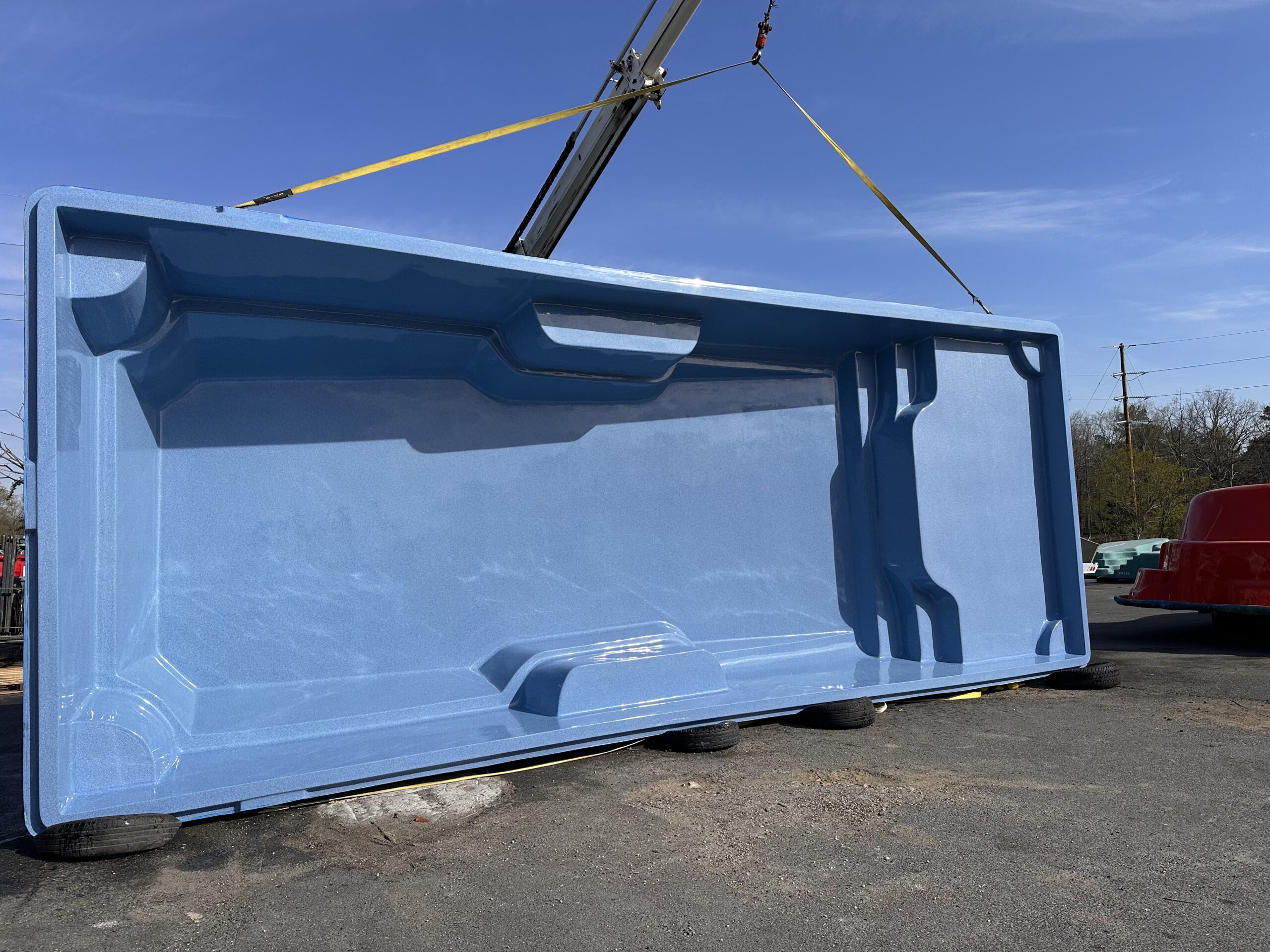 Avalon Fiberglass Pool with tanning ledge and bench seating